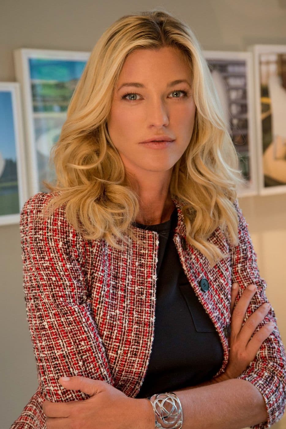Nicole Junkerman in a calm, softly lit room, looking gently toward the camera